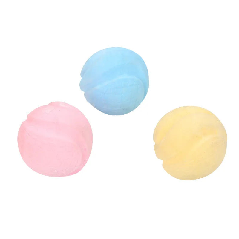 Blue TPR foam solid ball dog toy on a plain background