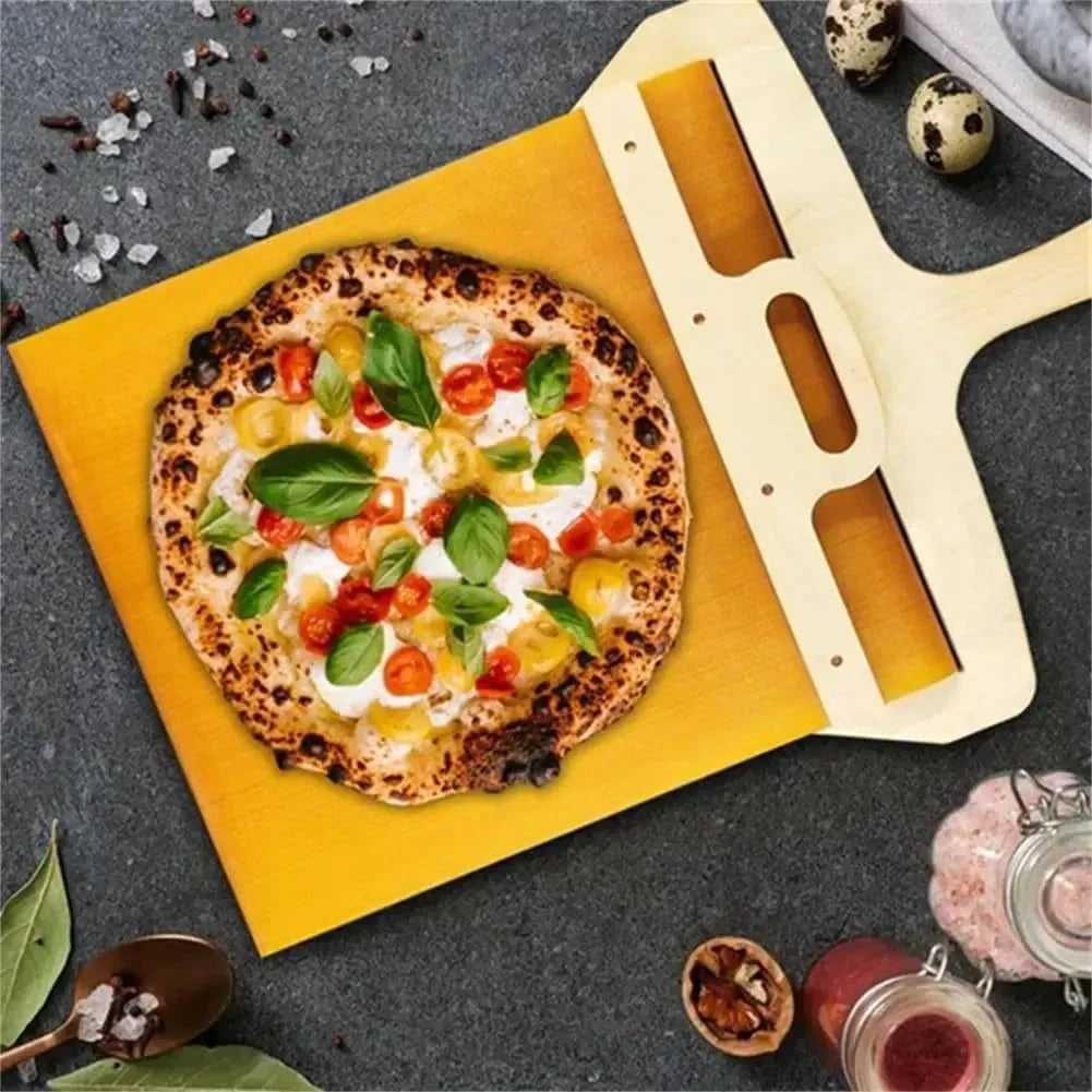 Natural wood pizza transfer shovel measuring 55cm with hanging hole for storage