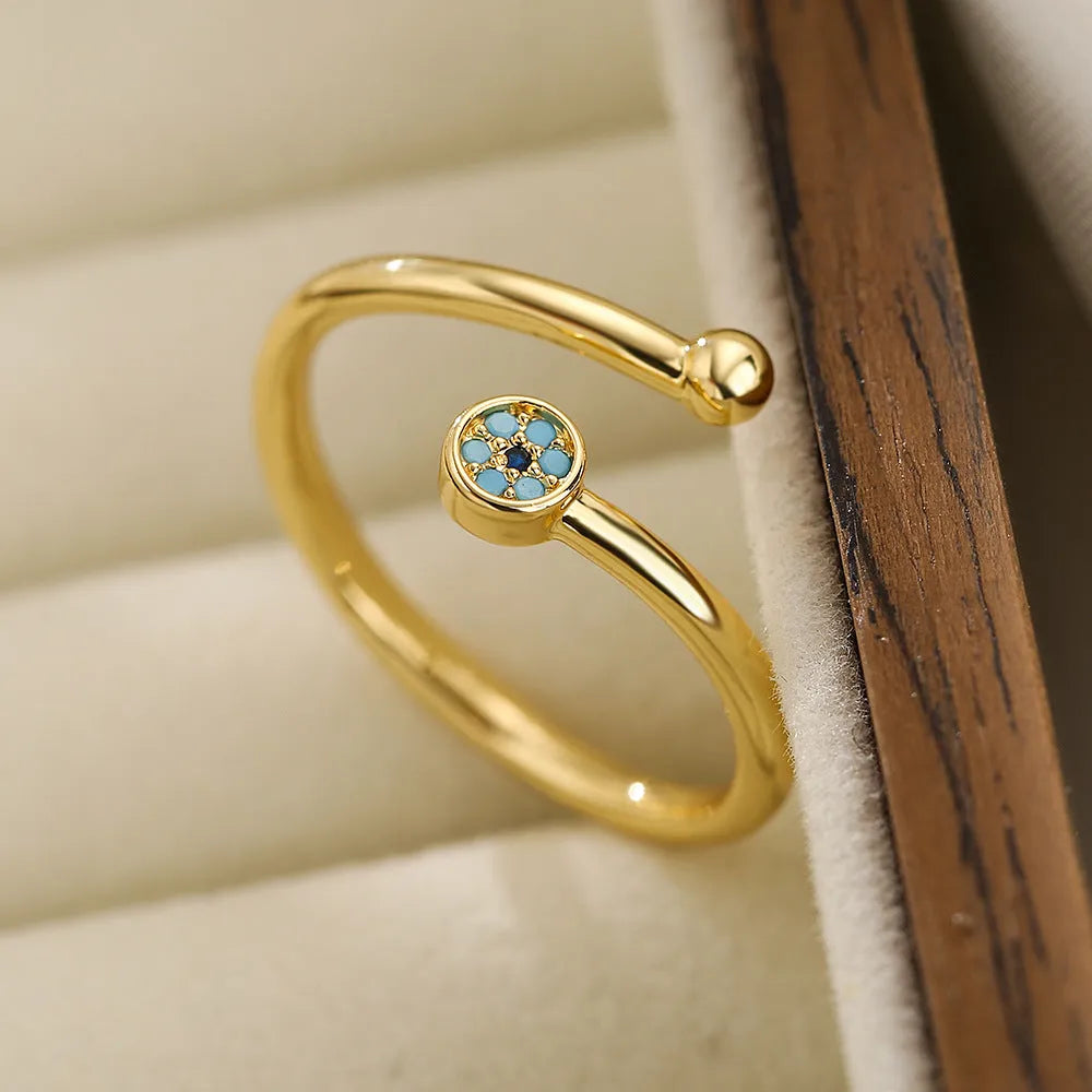 Clear CZ zircon cross evil eye ring with adjustable opening on copper band geometric shape