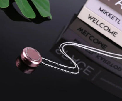Portable negative ion air purifier necklace in blue, white, and silver options