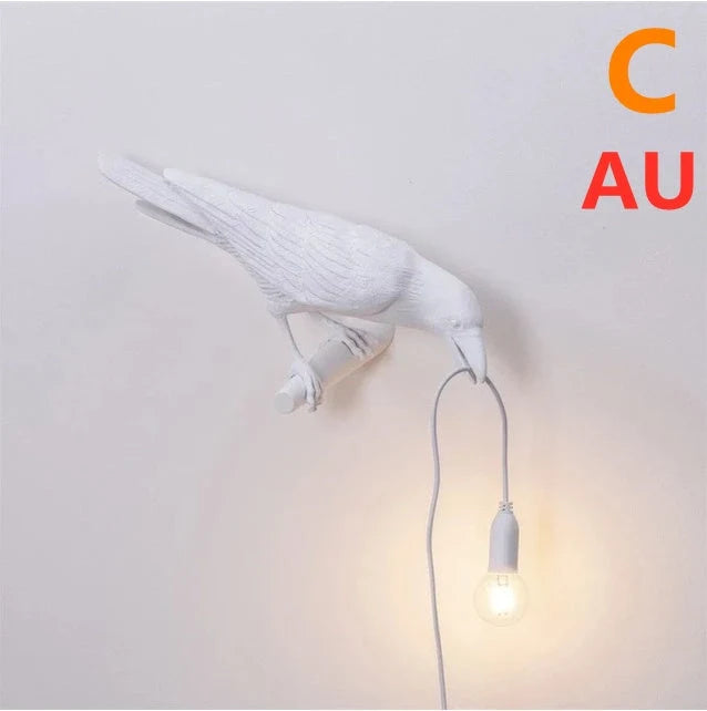 Auspicious Bird Resin Wall Lamp in white or black, featuring a unique bird design and G45 holder