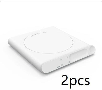 Adjustable Thermostat Coaster in white, blue, and pink with USB interface