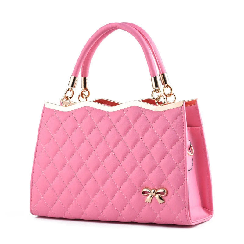 Crossbody shoulder bag with decorative bow in various colors, made from PU leather