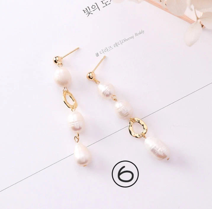 Vintage geometric pearl asymmetric earrings with 925 silver hooks, perfect for adding elegance to any outfit.