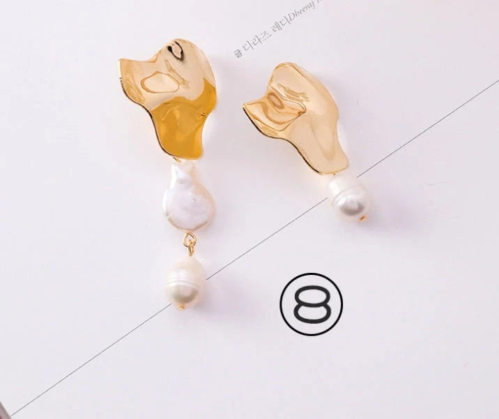 Vintage geometric pearl asymmetric earrings with 925 silver hooks, perfect for adding elegance to any outfit.