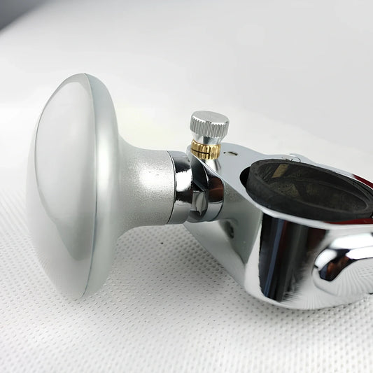 Adjustable stainless steel steering wheel booster in black, fitting up to 32mm thick rims for cars