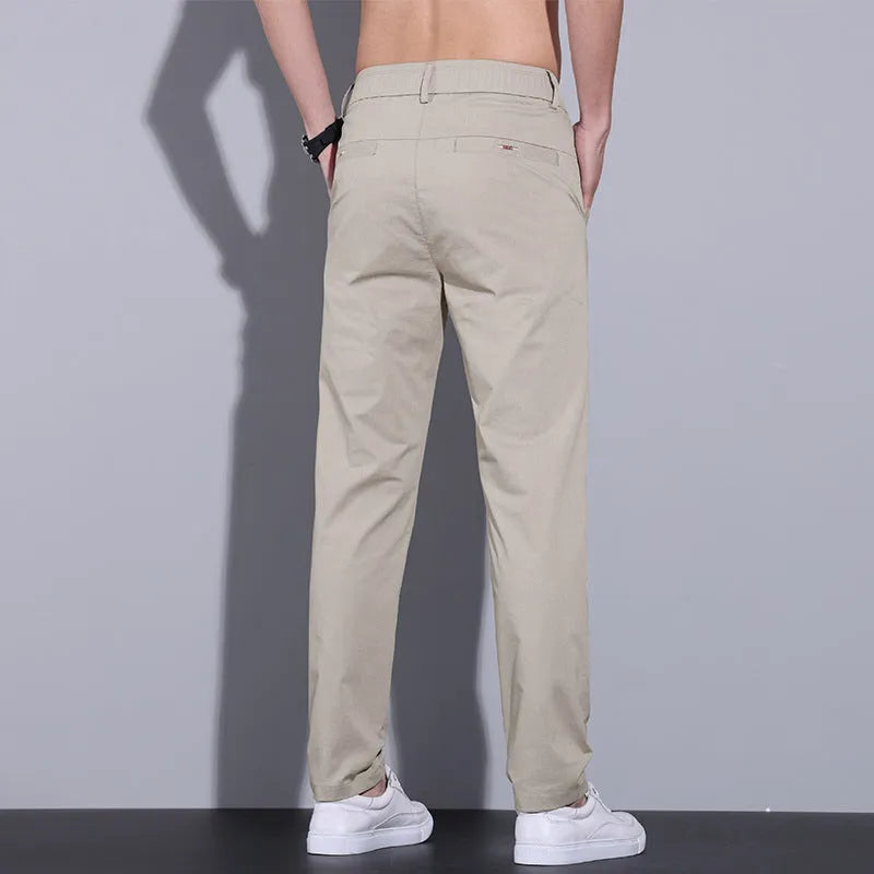 Men's straight slim-fit casual cotton trousers in light khaki colour.