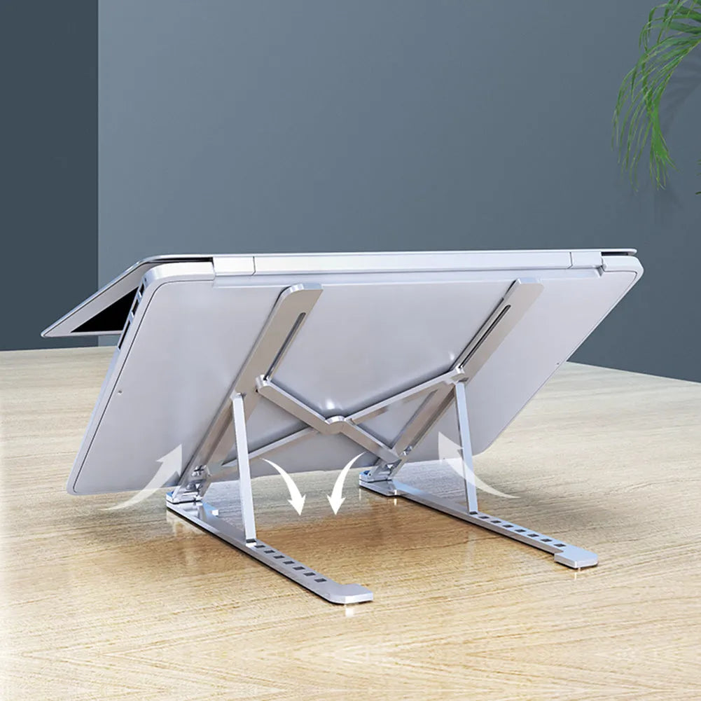 Foldable aluminium laptop stand in silver colour supporting a laptop, shown in open and closed positions.
