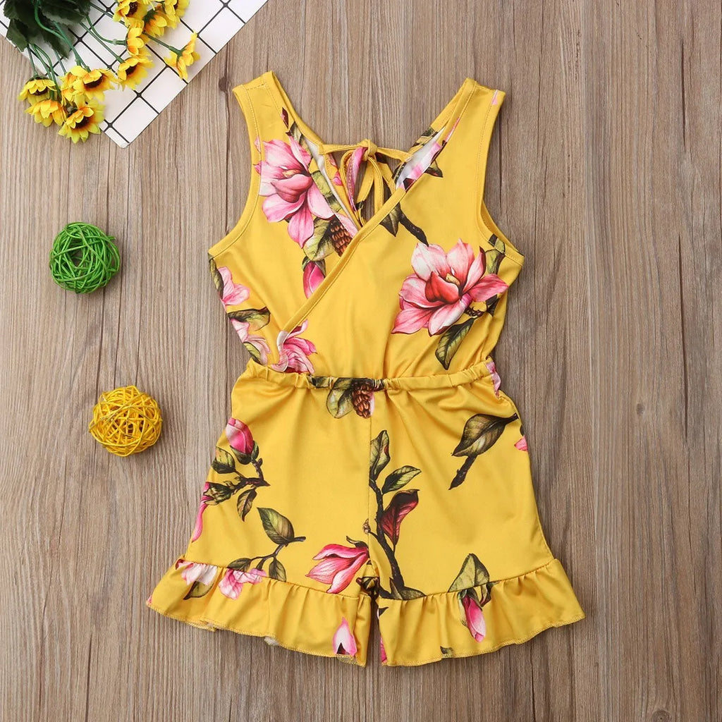 Baby girl wearing cotton floral summer outfit in white or yellow colour