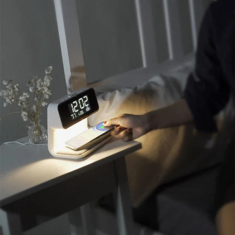 Wireless charging bedside lamp with alarm clock and phone charging capabilities