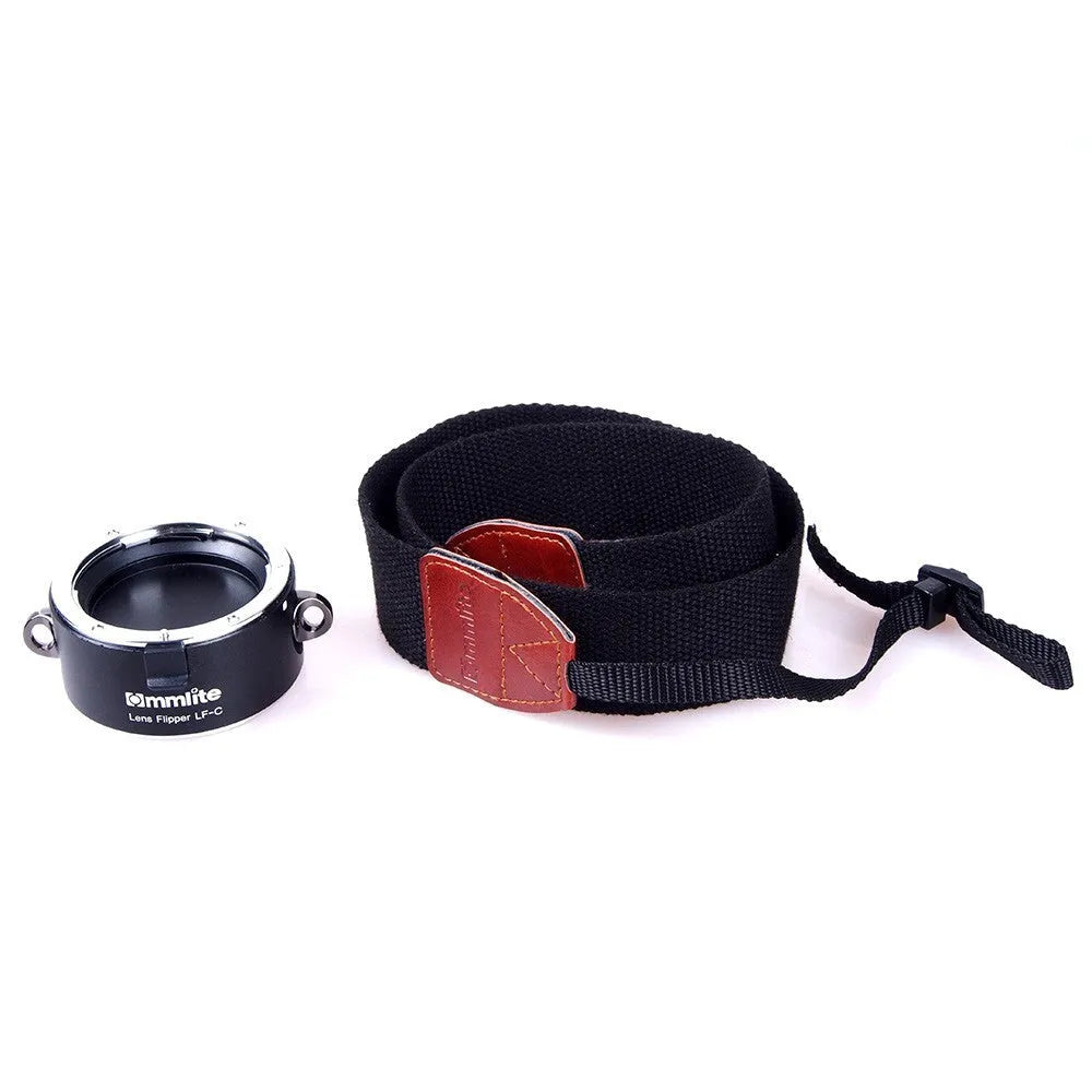 Aluminium alloy camera lens flipper dual holder with stainless steel buckle and cotton strap.