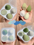 Makeup sponge egg box with four 6cm synthetic beauty sponges in grape, mango, mint, and peach colours