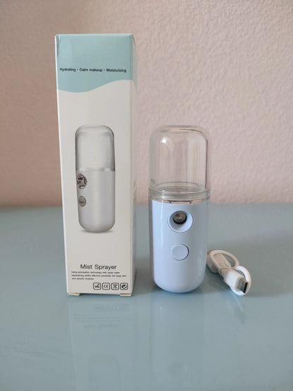 Compact portable nanospray humidifier for deep skin hydration in various colors