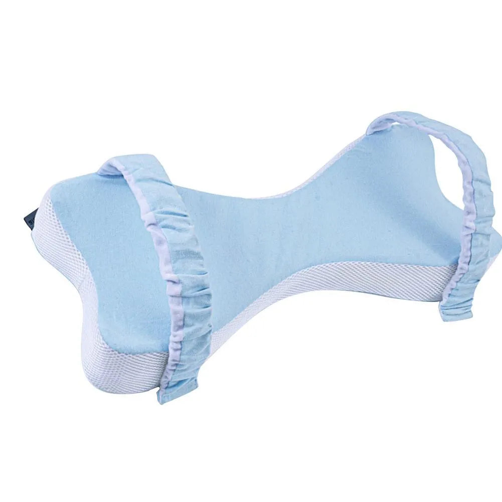 Memory cotton knee pillow in light blue on a bed, size 70x37x9cm for side sleeping support