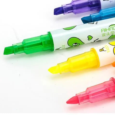 Set of six double-headed watercolour highlighter pens showing pink, orange, yellow, green, blue, and purple colours.