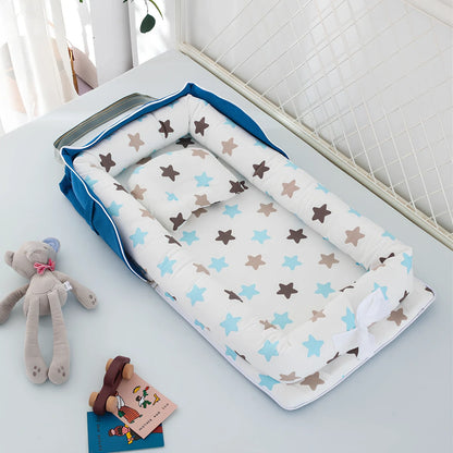Foldable cotton portable baby crib in Animal World Blue, 90x50 cm with pillow and strap, weighing 1.3 kg