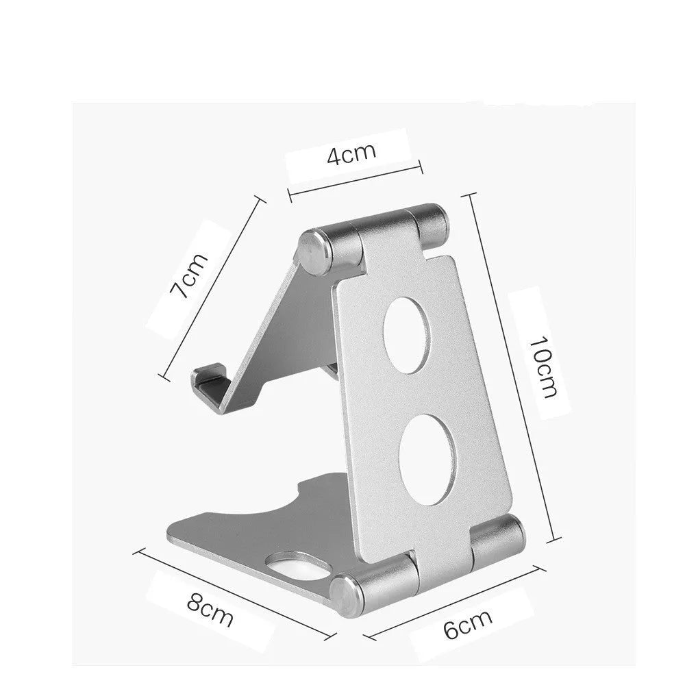 Folding mini mobile phone bracket in black on a wooden desk holding a smartphone