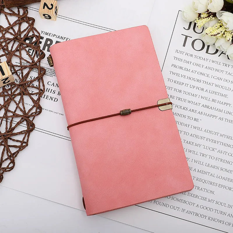 A6 cowhide rope style diary notebook in grey, pink, or red with imitation leather cover.