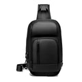 Black PVC outdoor shoulder bag with air cushion strap and internal organisation pockets