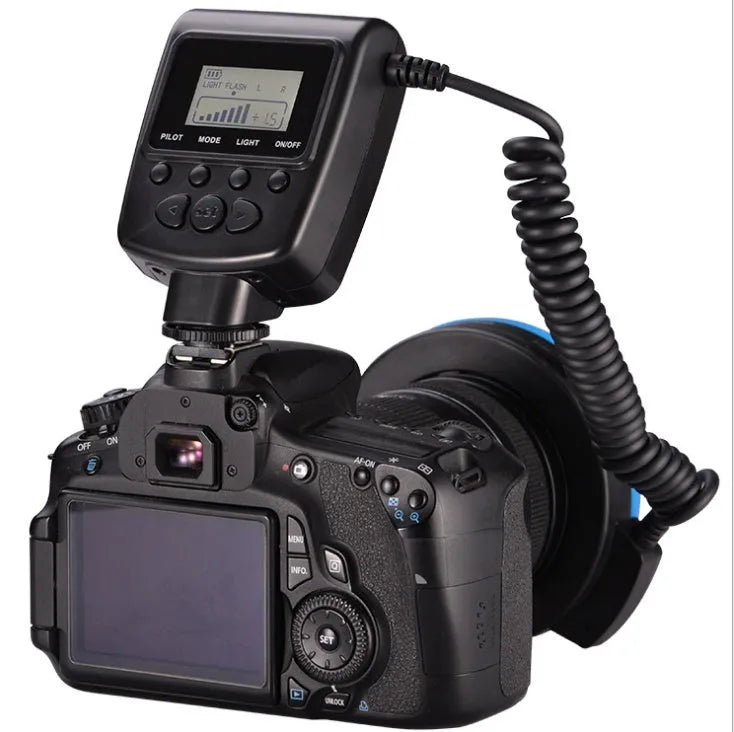 Traveller RF-550D macro ring flash with 48 LEDs, LCD display, and eight adapter rings 49-77mm on black background