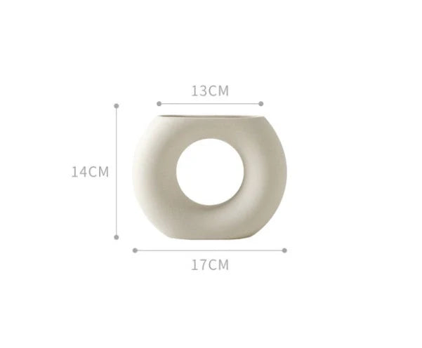 Nordic-inspired ceramic vase with minimalist design and art museum style