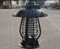 White solar mosquito lamp with purple switch and solar panel for garden insect control