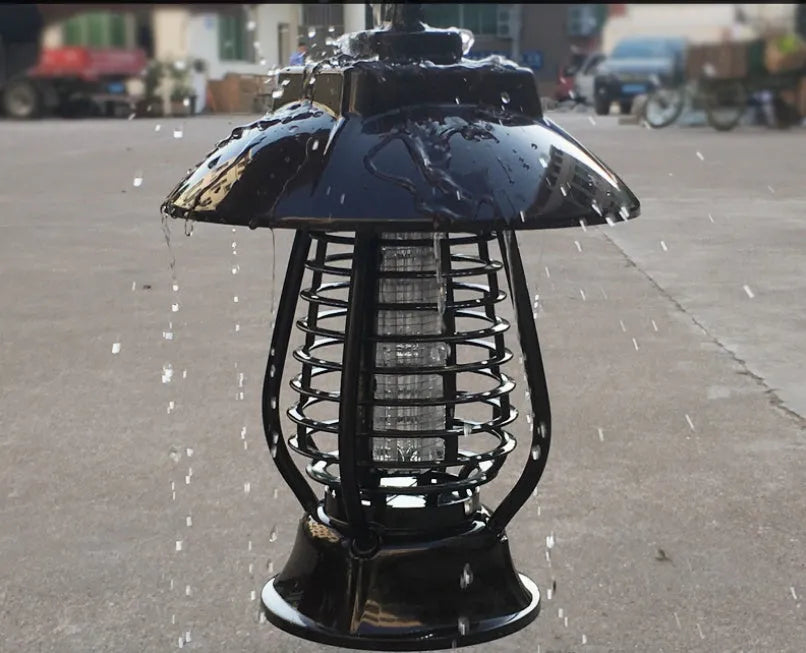 White solar mosquito lamp with purple switch and solar panel for garden insect control