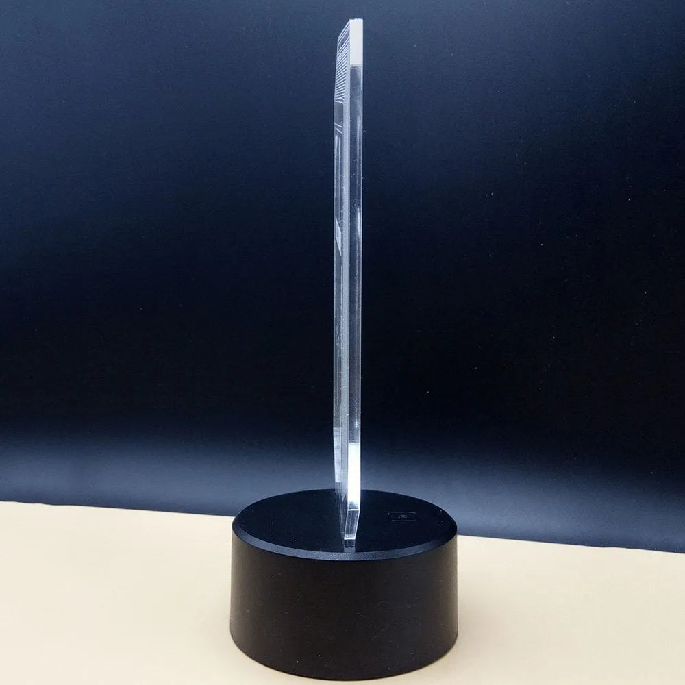 Acrylic 3D desk lamp with LED colour-changing lights and remote control on black ABS base