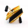 Yellow alloy steel two-hand marble handling clip with 150kg load capacity on stone surface