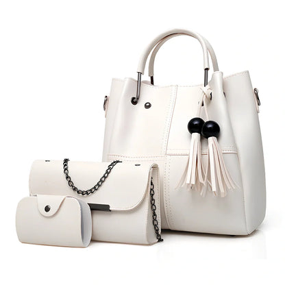 White three-piece tassel messenger bag set with 27x26x13cm main PU bag, zipper closure, and internal pockets for women