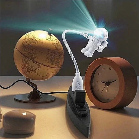 Astronaut USB Desk Lamp with flexible gooseneck arm and unique helmet switch