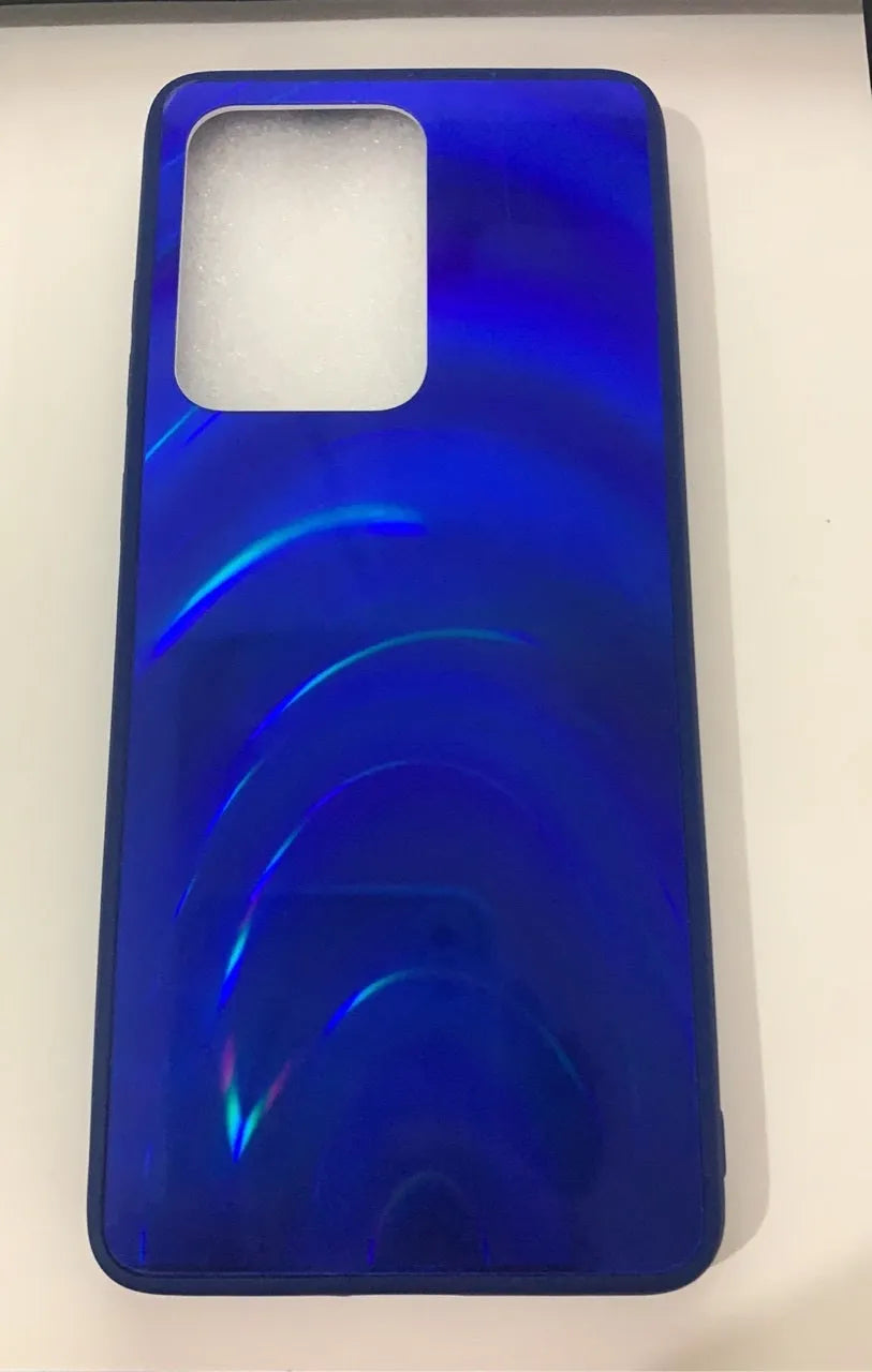 Marble pattern silicone phone case for Samsung Galaxy smartphone on a table.