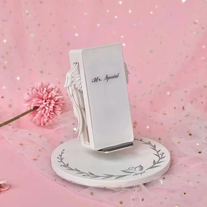 Angel Wings Wireless Charger with unfolding wings and aura base for fast 15W charging
