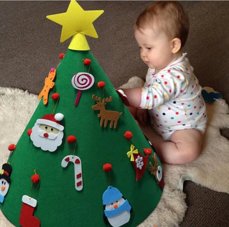 Felt Christmas tree three-dimensional DIY puzzle kit with cone base and felt balls on a surface
