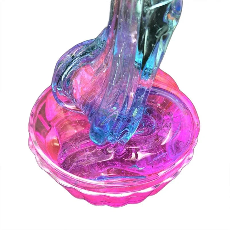 Gradient multicolor crystal mud slime in a plastic box, showcasing its vibrant colors and smooth texture