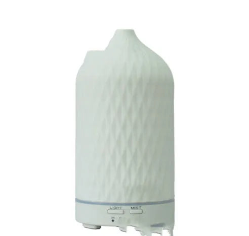 Ceramic ultrasonic aroma diffuser humidifier with 160ml water tank, remote control, and auto shut-off in a white finish