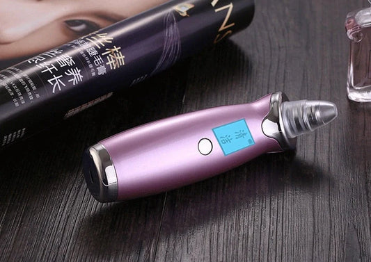 Blackhead vacuum cleaner with digital display showing 53KPa suction power and rose gold finish