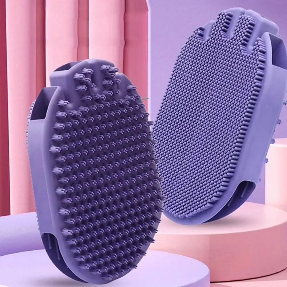 Purple pet grooming brush with soft silicone bristles and ergonomic TPR handle