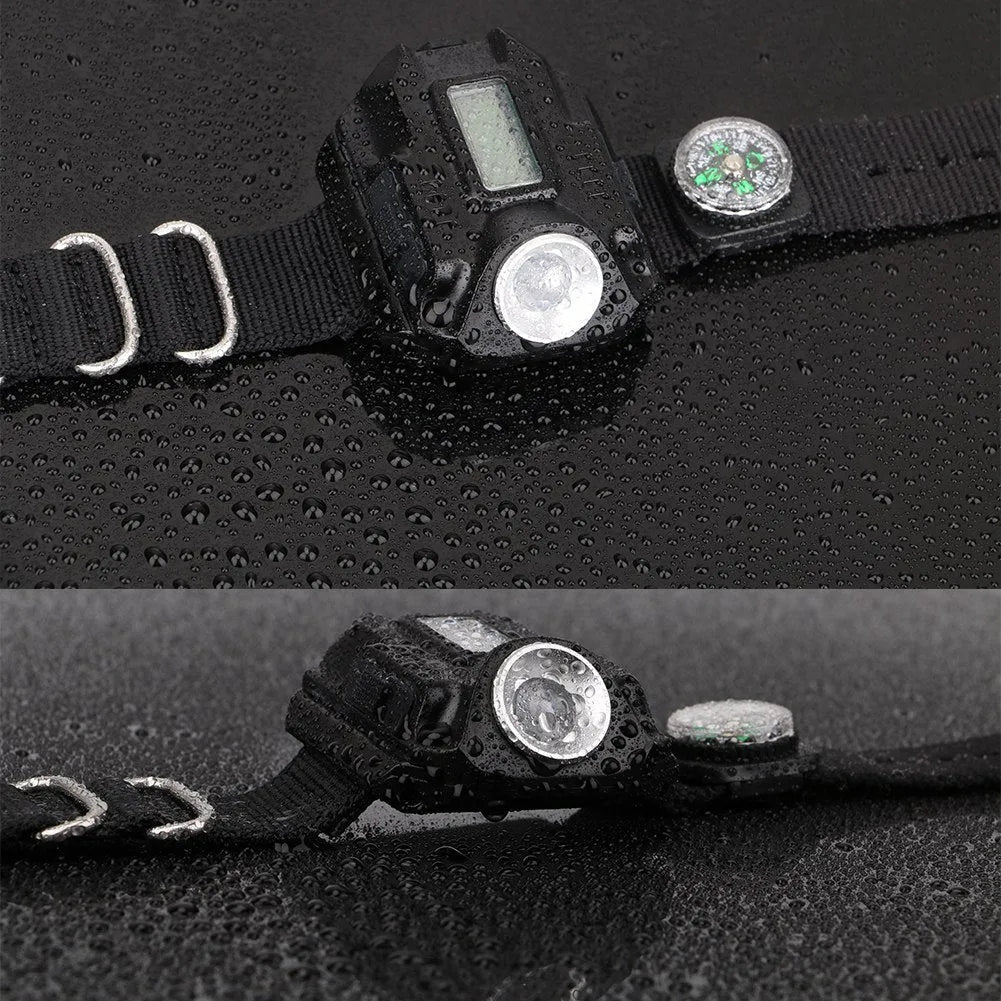 Black LED watch flashlight with time display and compass on wristband for outdoor use