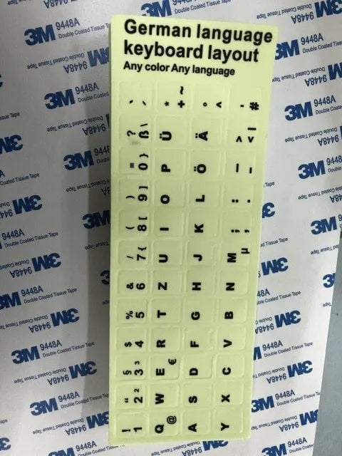 Yellow PVC keyboard stickers with glowing multilingual characters for desktop and laptop computers