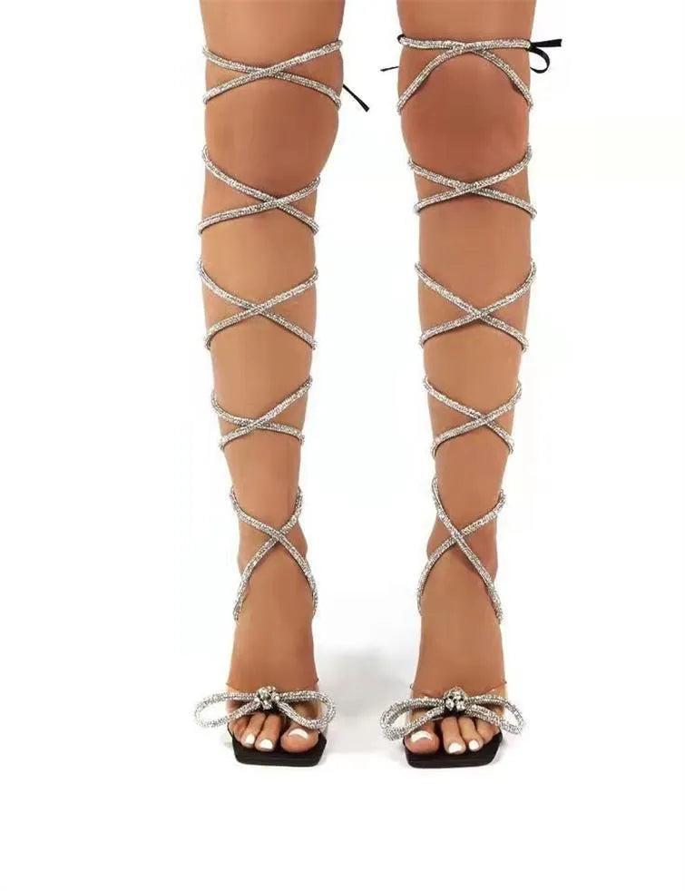 Plus size black strappy sandals with Roman rhinestone straps and square toe design
