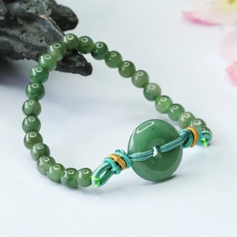 Jade bracelet with safety buckle showing emerald green 6mm star beads in national style design