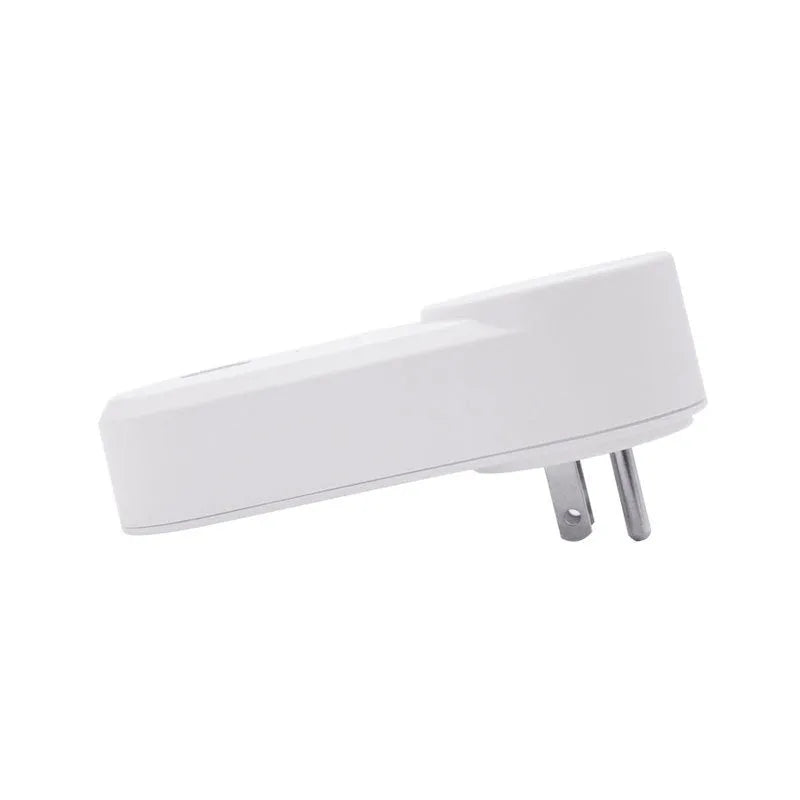 White Wi-Fi smart socket with UK and US plug options on a table