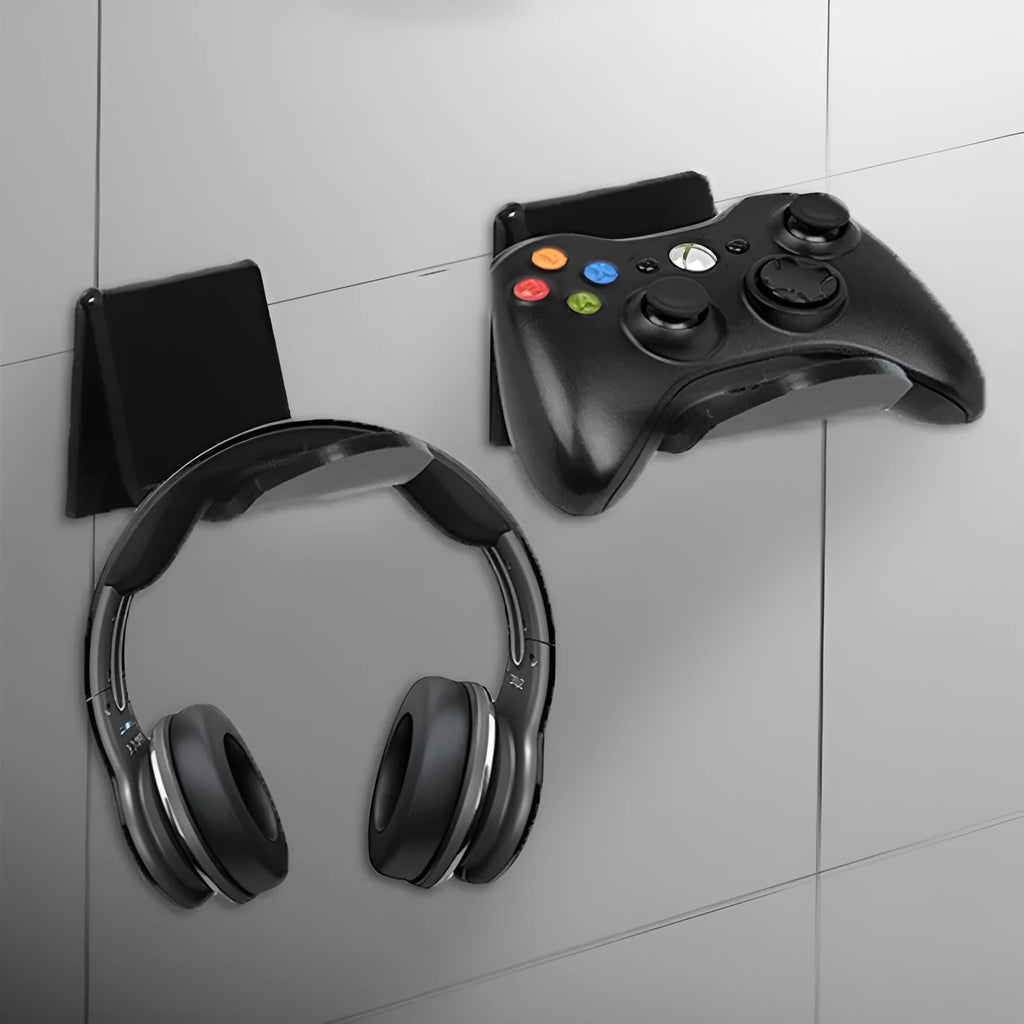 Plastic wall mounting bracket for video game controllers in black, white, or transparent finish.
