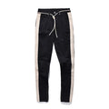 Men's ripped cotton denim slim fit jeans with distressed details in black and blue options