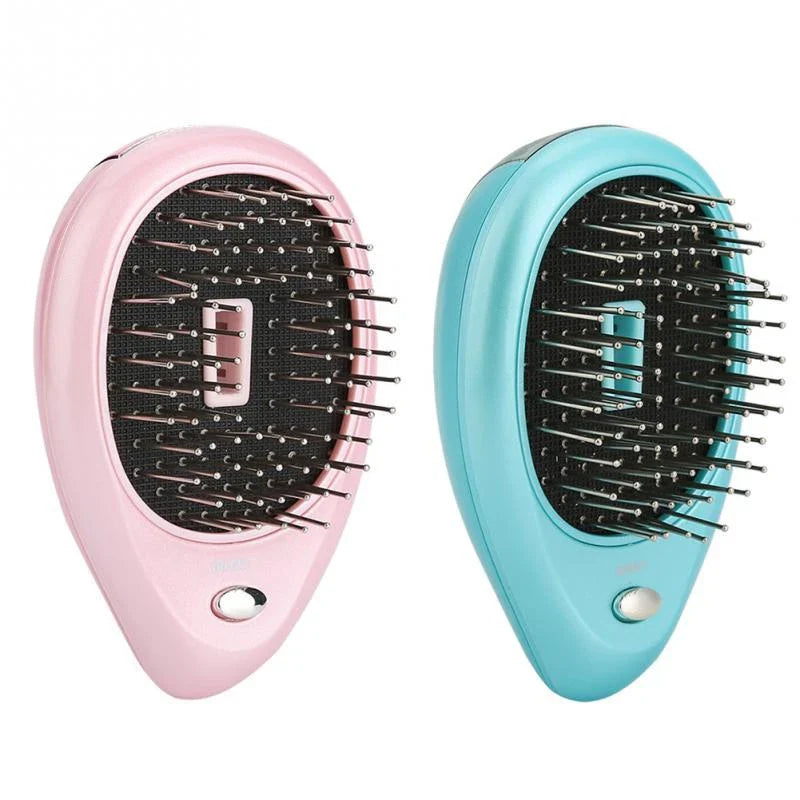 Portable negative ion hair comb with sound wave vibration technology in pink and green