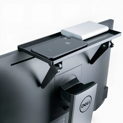 White ABS computer screen organiser rack with adjustable stands on office desk