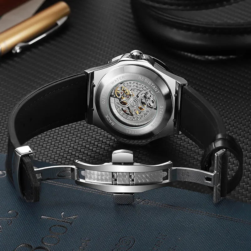 Men's automatic mechanical watch with diamond studs on a hollow dial, shown in a 16mm case.