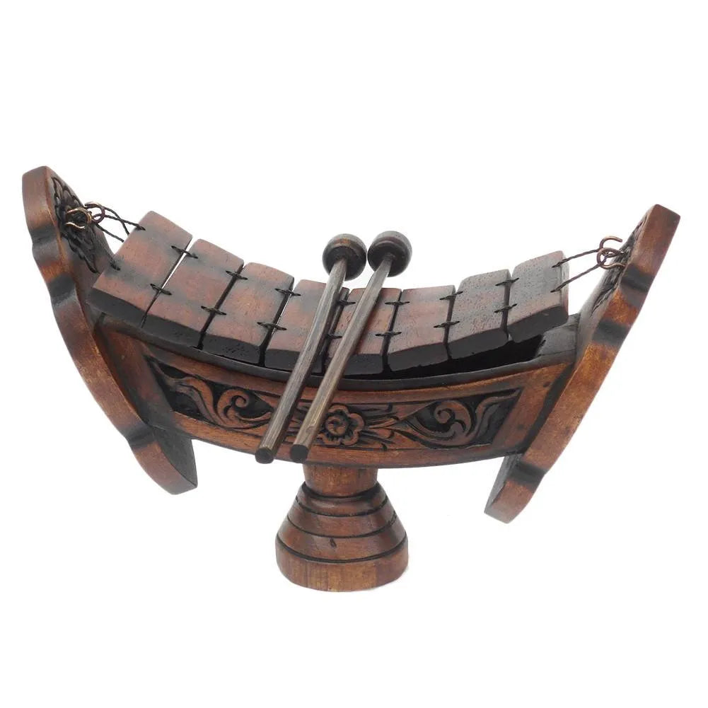 Brown wooden hand xylophone decorative pendant measuring 27x16cm in Southeast Asian style