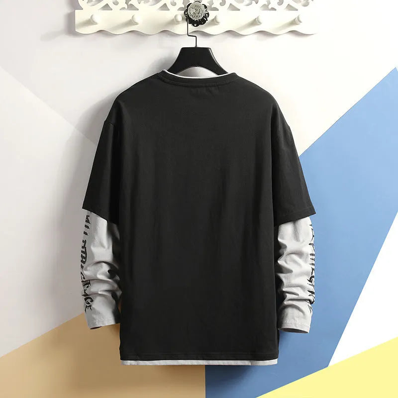 Fake two printed round collar cotton blend t-shirts in black, light grey, and white on a neutral background
